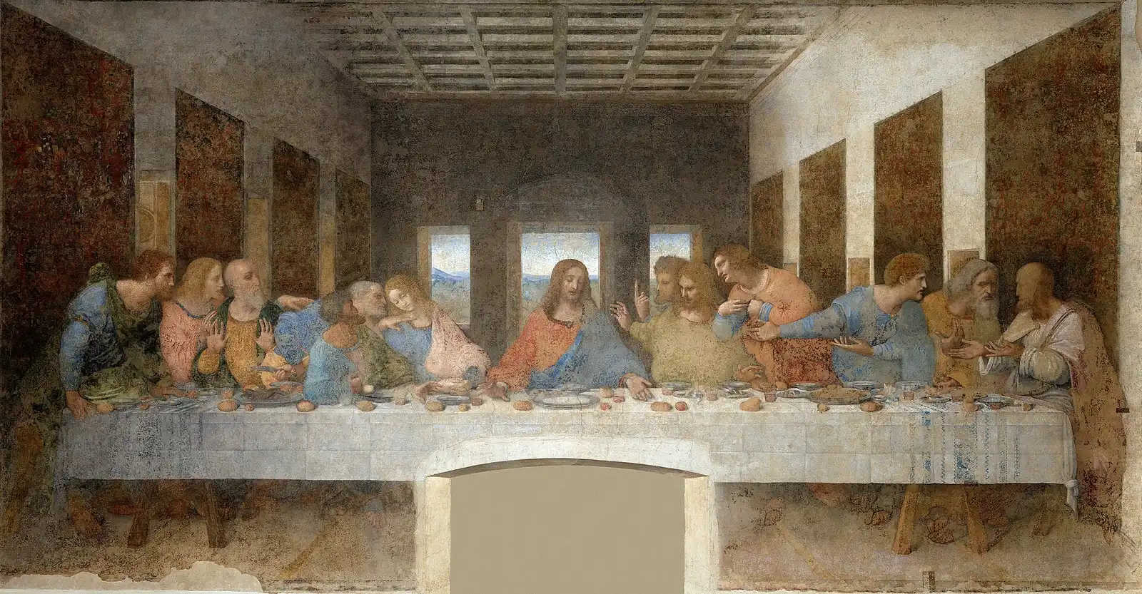 Leonardo's The Last Supper: Christ and the apostles at a long table in a receding room.