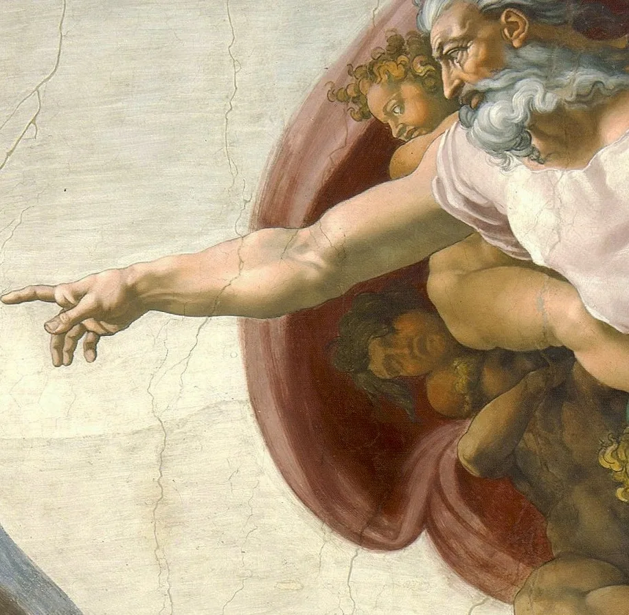 Detail of God's outstretched arm and hand and the figures inside the red cloak, showing the matte plaster surface and fine cracks.